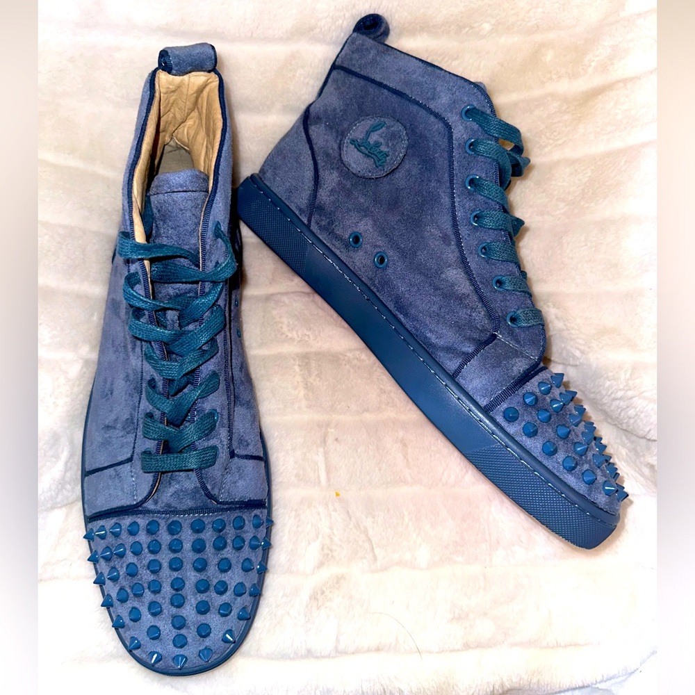 Men’s Christian Louboutin sneakers in light blue.